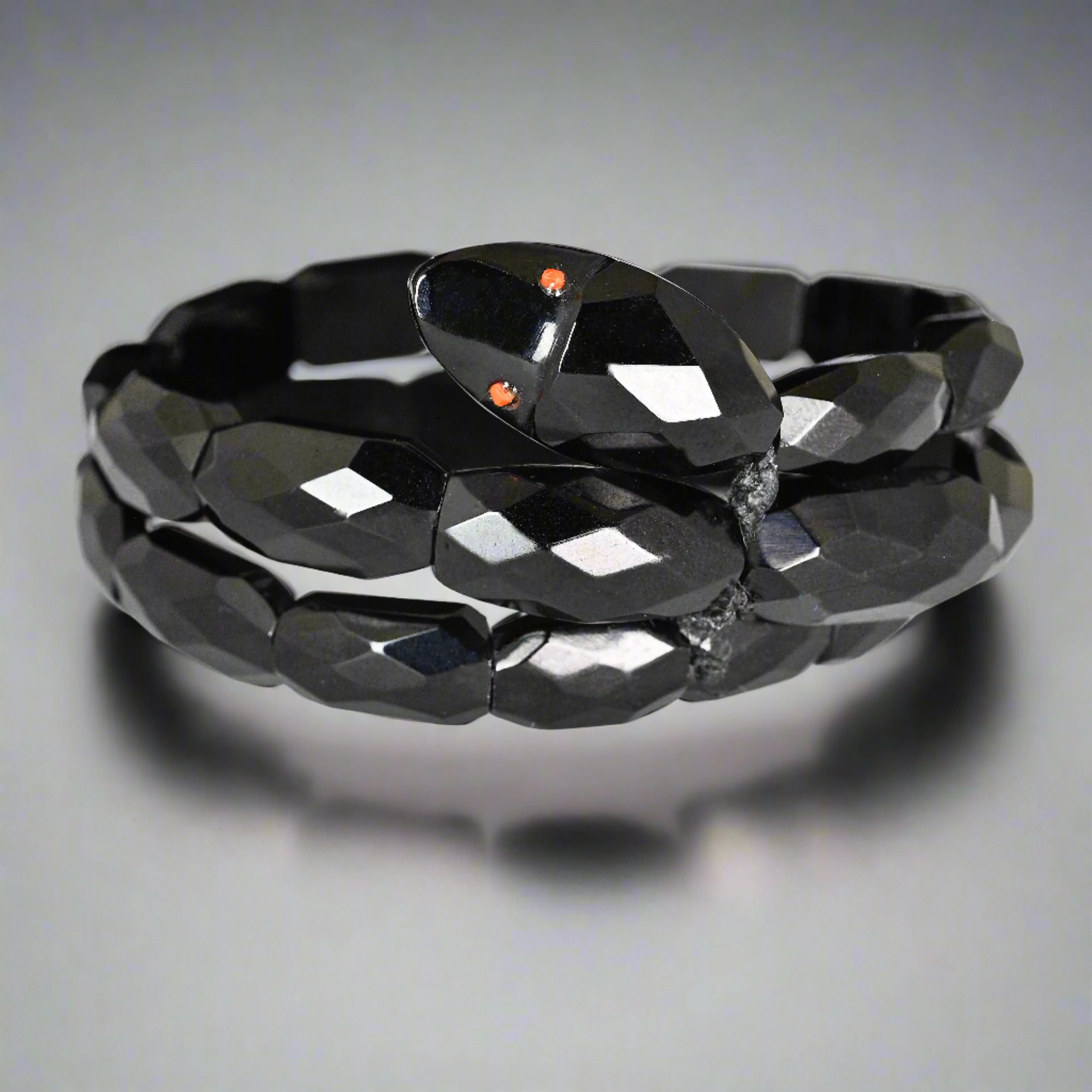 Antique Victorian Coral Eyed Whitby Jet Snake Bracelet
