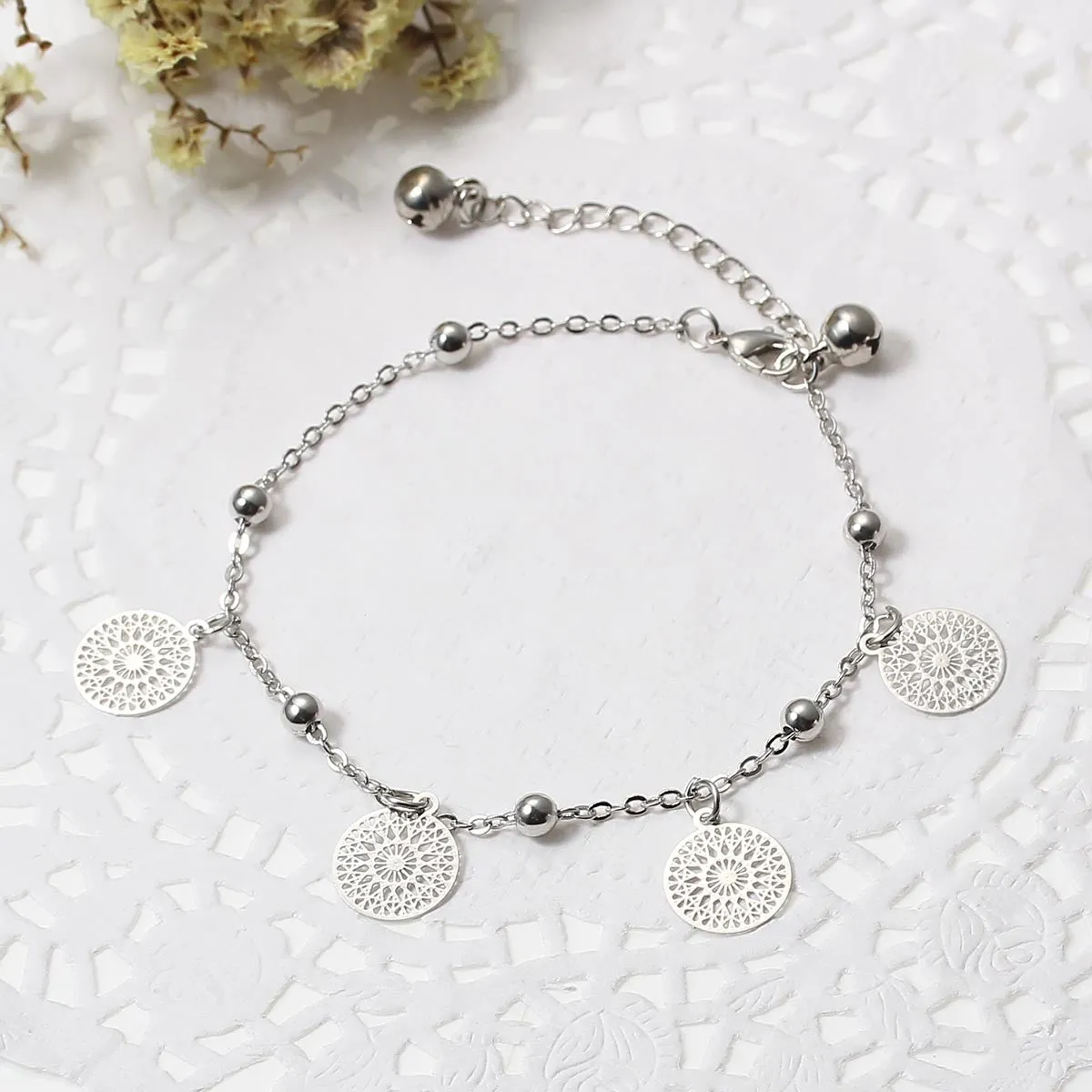 SEXY SPARKLES Filigree Stamping Bell Bracelet Silver Tone Round Hallow Pendants