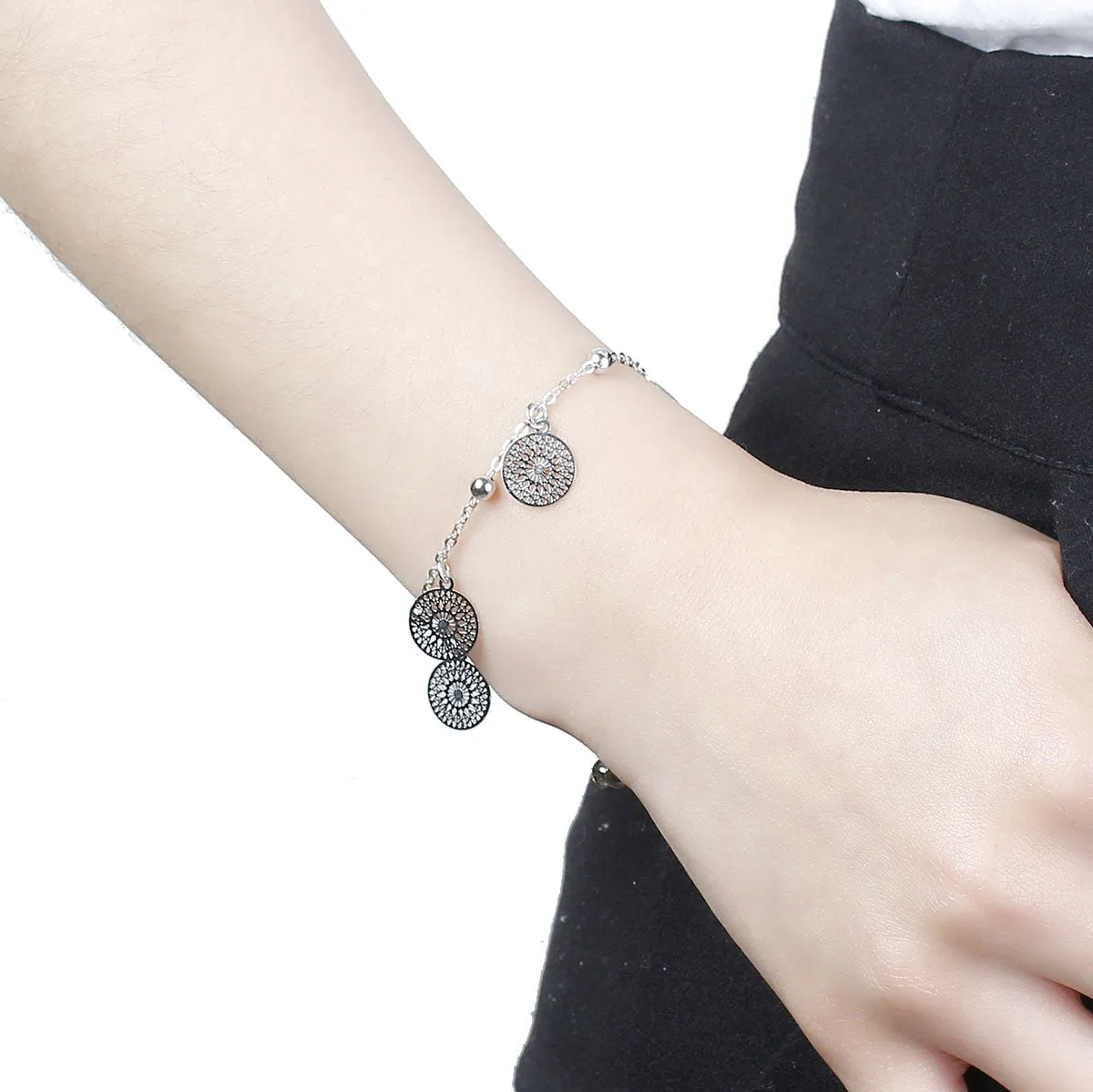 SEXY SPARKLES Filigree Stamping Bell Bracelet Silver Tone Round Hallow Pendants