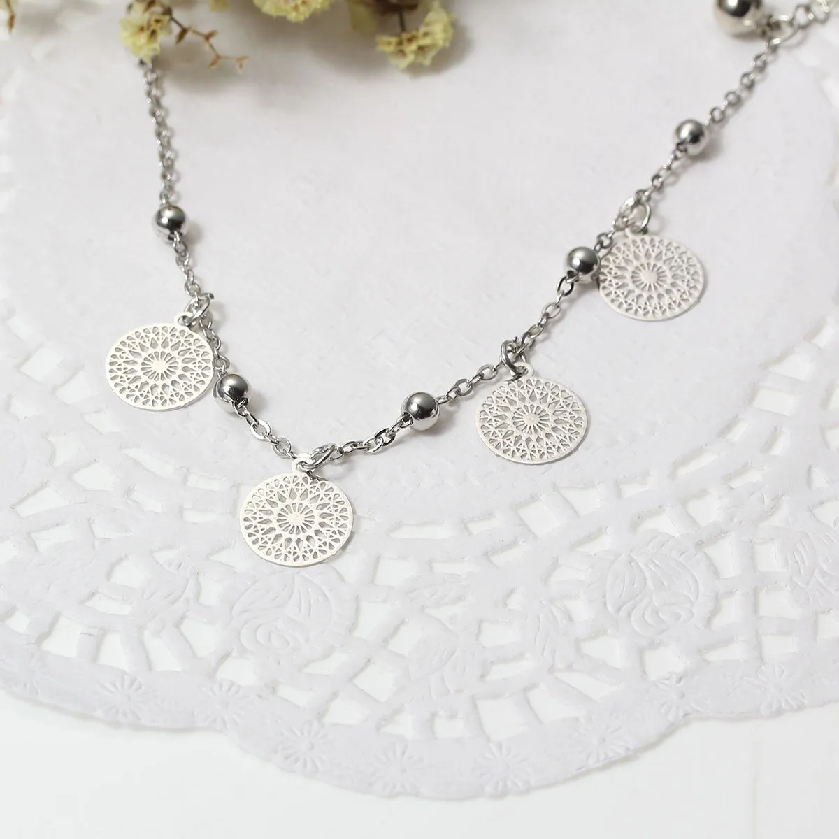 SEXY SPARKLES Filigree Stamping Bell Bracelet Silver Tone Round Hallow Pendants